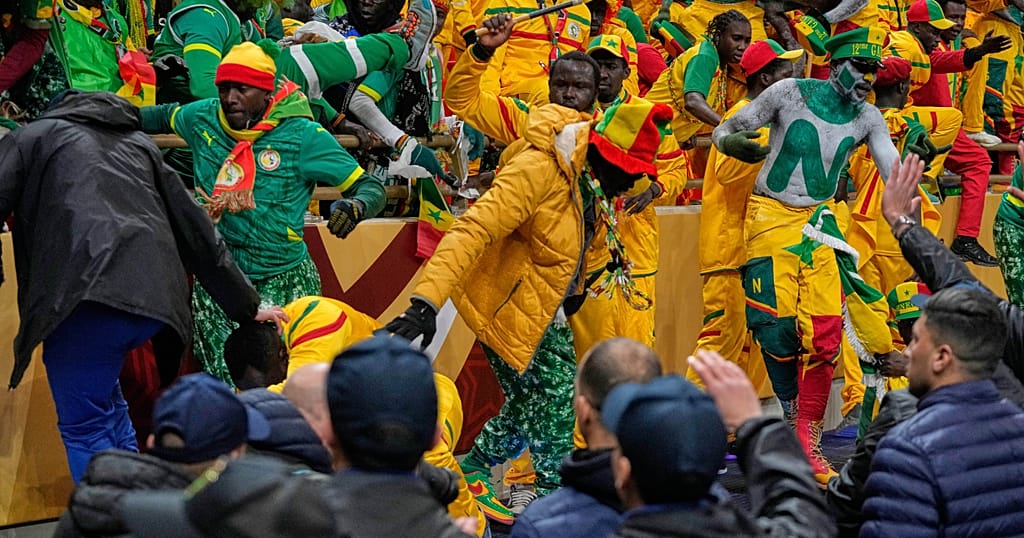 Senegal football fans return home relieved after Moroccan king's pardon