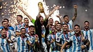 FILE - Argentina's Lionel Messi lifts the trophy after winning the World Cup final soccer match between Argentina and France at the Lusail Stadium in Qatar.