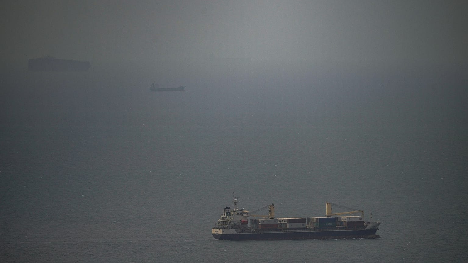 The Jordan-flagged cargo ship "Baghdad" sails in the Persian Gulf towards the Strait of Hormuz in the United Arab Emirates, 22 April 2026