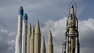 FILE: Iran's domestically built missiles and satellite carriers are displayed in a permanent exhibition at a recreational area in northern Tehran, Iran, 24 March 2026