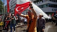 Police use water cannon to disperse supporters of the CHP during a rally in Izmir, 26 May, 2026