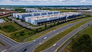 Cars drive past data centres in Virginia, July 16, 2023.