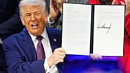 يحمل الرئيس دونالد ترامب الميثاق خلال حفل التوقيع على مبادرة مجلس السلام في الاجتماع السنوي للمنتدى الاقتصادي العالمي في دافوس بسويسرا، الخميس 22 يناير 2026.