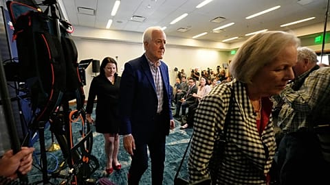 Senator John Cornyn leaves an election night event in Austin, Texas after losing the Republican Party's Senate nomination.