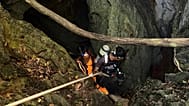 Rescuers try to reach people who have been trapped in a cave in Xaisomboun province, 26 May, 2026