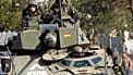 Archivo: Soldados españoles de la KFOR patrullan en vehículos militares la zona norte de Kosovska Mitrovica