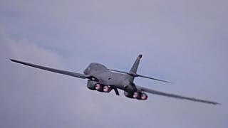 A US B1 Lancer bomber takes off from RAF Fairford, England, Thursday, March 26, 2026. (AP Photo/Alastair Grant)