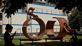 A statue titled 'Chains' created by French artist Driss Sans-Arcidet in a Paris park, 27 May, 2026