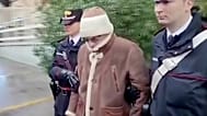 Matteo Messina Denaro being escorted from a Carabinieri police station shortly after his arrest in Palermo, 16 January, 2023