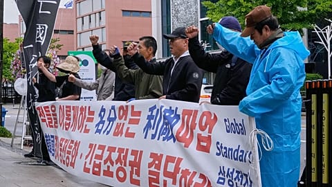 A group of shareholders of Samsung Electronics Co. hold a rally