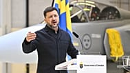 Ukraine's President Volodymyr Zelenskyy and Sweden's Prime Minister Ulf Kristersson, not seen, give a joint news conference at the F16 air flotilla in Uppsala, Sweden.