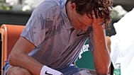 Jannik Sinner cools himself with the water during a break at the second round men's singles tennis match in Paris, 28 May, 2026