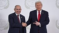 FILE: US President Donald Trump greets Armenia's Premier Nikol Pashinyan during a summit to support ending the Israel-Hamas war in Gaza, in Sharm El Sheikh, 13 October 2025