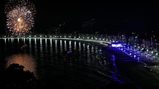 Fireworks explode as fans pack the shores of Copacabana Beach to watch a free concert by Colombian pop star Shakira in Rio de Janeiro,