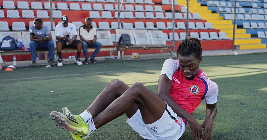 Haitian island-based soccer World Cup player still waiting for US visa
