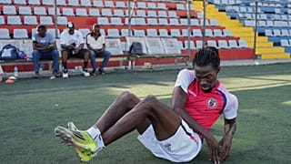 Haitian island-based soccer World Cup player still waiting for US visa