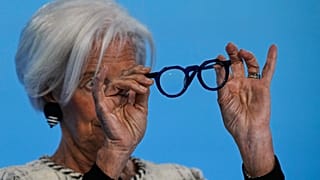 ECB President Christine Lagarde watches her glasses during a press conference after a governing council meeting in Frankfurt, Germany, 30 April 2026