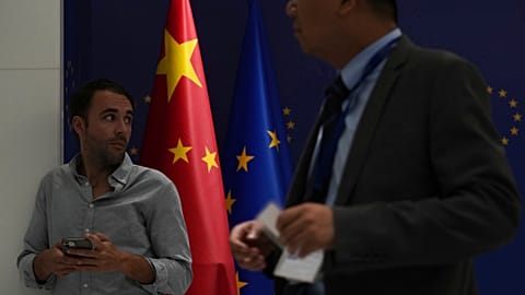 Journalists wait for a press conference of European Commission President Ursula von der Leyen in Beijing, Thursday, July 24, 2025.