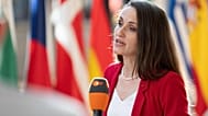 Romania's Foreign Minister Oana-Silvia Toiu speaks with the media as she arrives for a meeting of EU general affairs ministers at the European Council building in Brussels, Tu