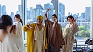 Models wearing Qatari fashion brand LIN pose for the camera.