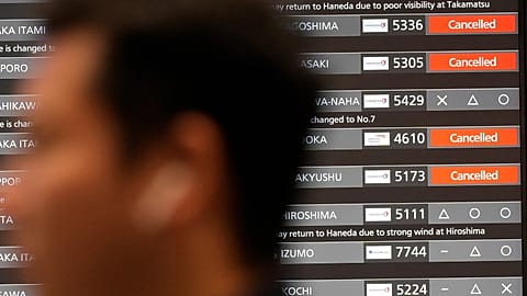 A departing flight information board shows that some flights were canceled due to an approaching Typhoon Shanshan at Haneda airport, 29 August, 2024