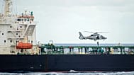 A French soldier rappels down from a helicopter to the Deyna tanker in the Mediterranean, 20 March, 2026