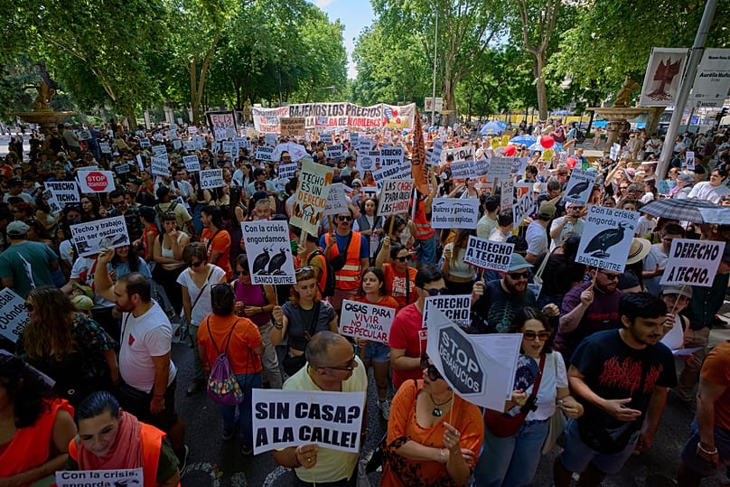 Several people take part in a protest in Madrid, Spain, on Sunday 24 May 2026, against rising housing prices.