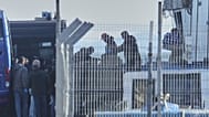 Italian authorities transferring irregular migrants to an Italian-run migration detention center in Shengjin, Albania. This centre is considered as a model for the return hubs