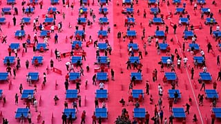 People play table tennis on the pitch of the Luzhniki Stadium during the table tennis festival in Moscow, Sunday, May 31, 2026
