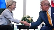 President Donald Trump and European Commission President Ursula von der Leyen shake hands after reaching a trade deal at the Trump Turnberry golf course in Turnberry, Scotland