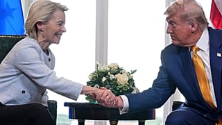 President Donald Trump and European Commission President Ursula von der Leyen shake hands after reaching a trade deal at the Trump Turnberry golf course in Turnberry, Scotland