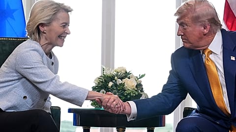 President Donald Trump and European Commission President Ursula von der Leyen shake hands after reaching a trade deal at the Trump Turnberry golf course in Turnberry, Scotland