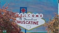 A mural on the side of a building is shown in downtown Muscatine, Iowa
