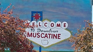 A mural on the side of a building is shown in downtown Muscatine, Iowa