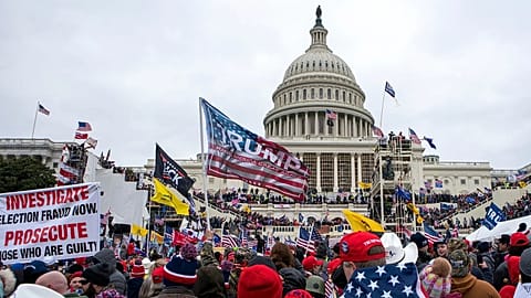 Rioters loyal to President Donald Trump are pictured at the US Capitol in Washington, 6 January, 2021