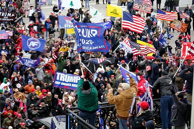 Rioters loyal to President Donald Trump are pictured at the US Capitol in Washington, 6 January, 2021