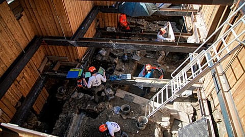 Archaeological workers dig 4 meters underground during excavations outside Notre-Dame Cathedral in Paris.