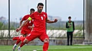 FILE - Iran's Mehdi Taremi shoots a penalty kick to score his side's second goal during a friendly soccer match between Iran and Costa Rica, in Antalya