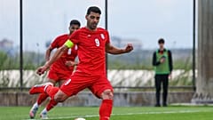 FILE - Iran's Mehdi Taremi shoots a penalty kick to score his side's second goal during a friendly soccer match between Iran and Costa Rica, in Antalya