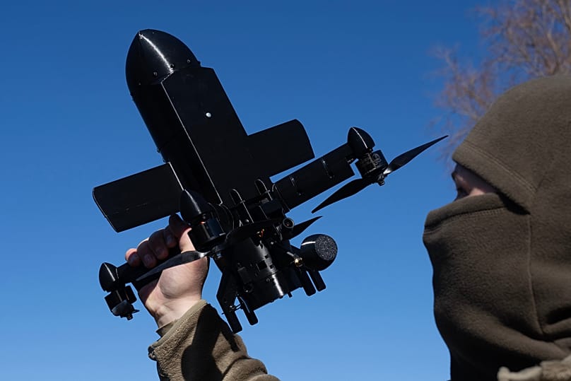 FILE - An instructor from the Ukrainian company General Cherry demonstrates the operation of an anti-air interceptor drone in Kyiv region, on March 11, 2026