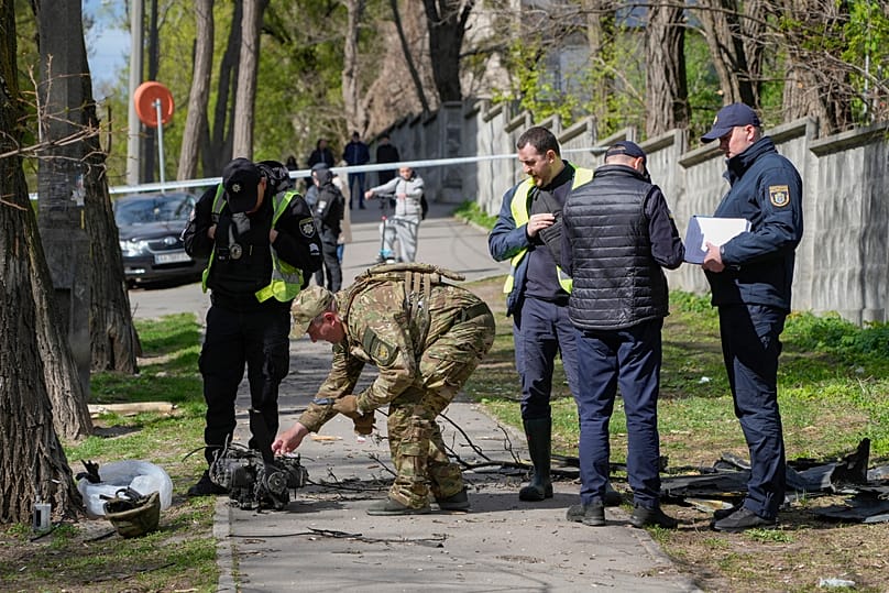 Police officers inspect fragments of a Russian drone after an air attack in Kyiv, Ukraine, 28 April, 2026. 