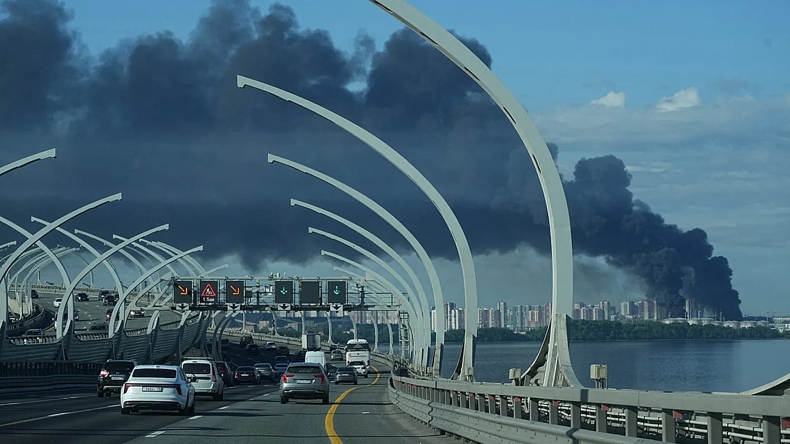 A plume of black smoke is seen over the port of St. Petersburg, Russia, Wednesday, June 3, 2026, after a Ukrainian drone attack.