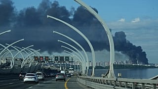 A plume of black smoke is seen over the port of St. Petersburg, Russia, Wednesday, June 3, 2026, after a Ukrainian drone attack.
