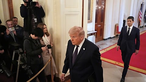 President Donald Trump, left, and Kevin Warsh arrive at a swearing-in ceremony for Warsh as Chairman of the Federal Reserve in the East Room of the White House, Friday, May 22