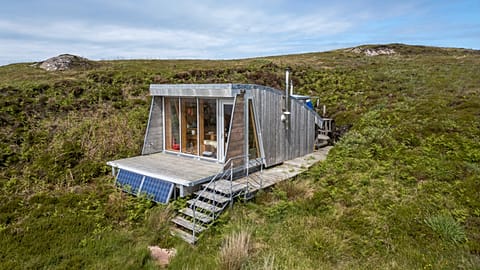 The 88-acre property boasts beautiful nature, an isolated location, and a tiny cabin 