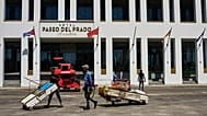 Fishermen on makeshift rafts sail past the Paseo del Prado hotel, part of the Canadian Blue Diamond chain, in Havana.