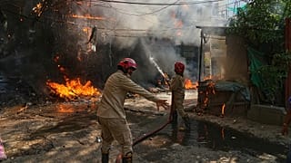 Firefighters attempt to douse a fire at a hotel in New Delhi, 3 June, 2026