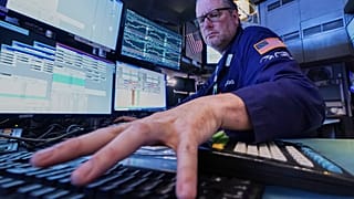 Specialist Gregg Maloney works at his post on the floor of the New York Stock Exchange, 1 June 2026