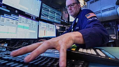 Specialist Gregg Maloney works at his post on the floor of the New York Stock Exchange, 1 June 2026