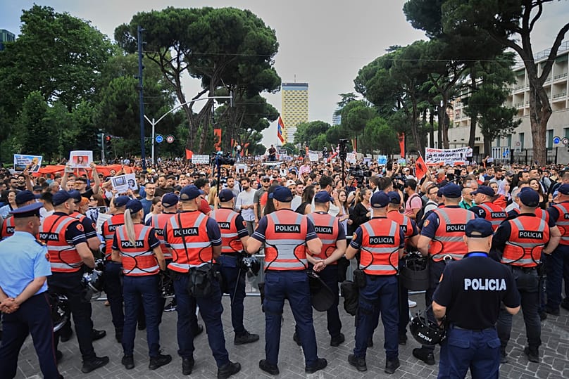 Police officers block a street during a demonstration in Tirana, 3 June, 2026